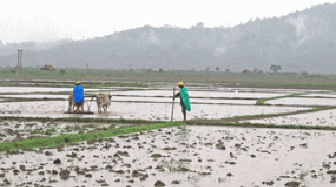 Farmers plough fields in Kachin State’s Mogaung township last week.