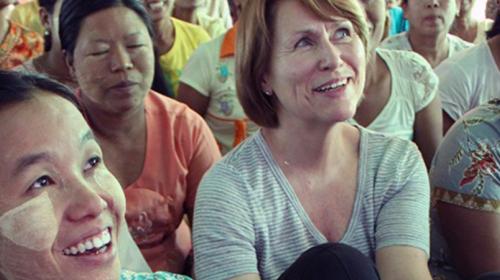  UNOPS Executive Director, Ms. Grete Faremo chats with clients from Pact Global Microfinance (PGMF)  Photo:  B. Guillemot /UNOPS