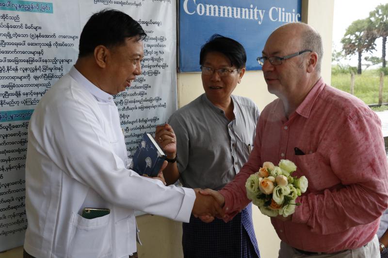 H.E Alistair Burt and the team at a rural health centre in Dedaye